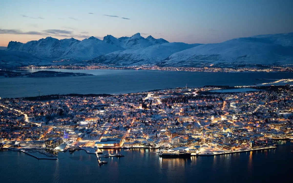 Tromso seen from the water at dusk